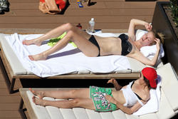 http://img287.imagevenue.com/loc357/th_106379330_BrooklynDecker_BikiniSydney_April8_2012_31_122_357lo.jpg